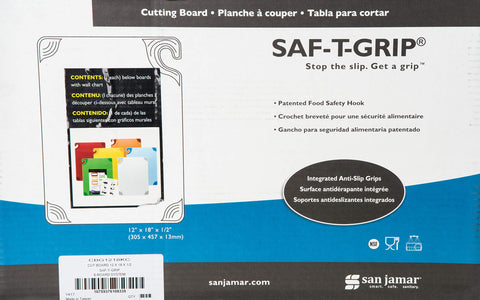 San Jamar Saf-T-Grip next to chef's knife showing 12x18 board scale for context