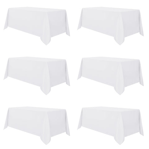 sancua front flat lay showing six white tablecloths for easy event prep
