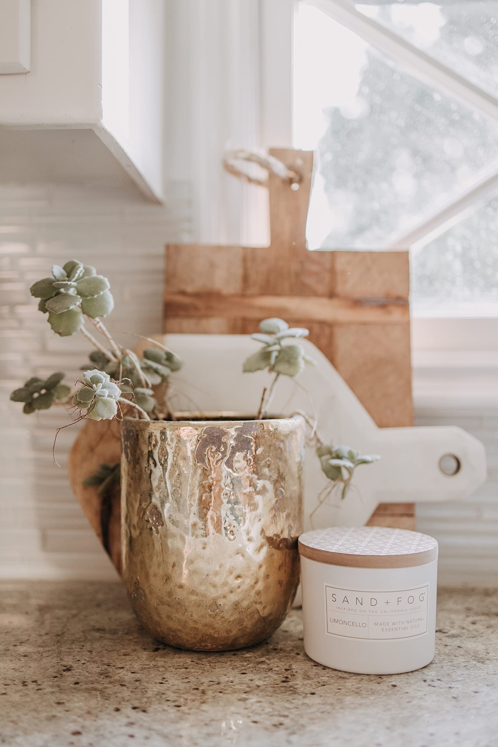 Sand + Fog candle lit in living room, improving ambiance and fragrance reach