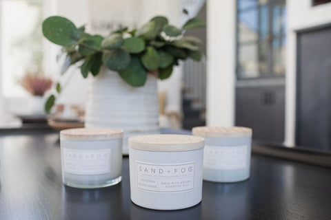 Sand + Fog candle burning in living room creating relaxing beachlike atmosphere