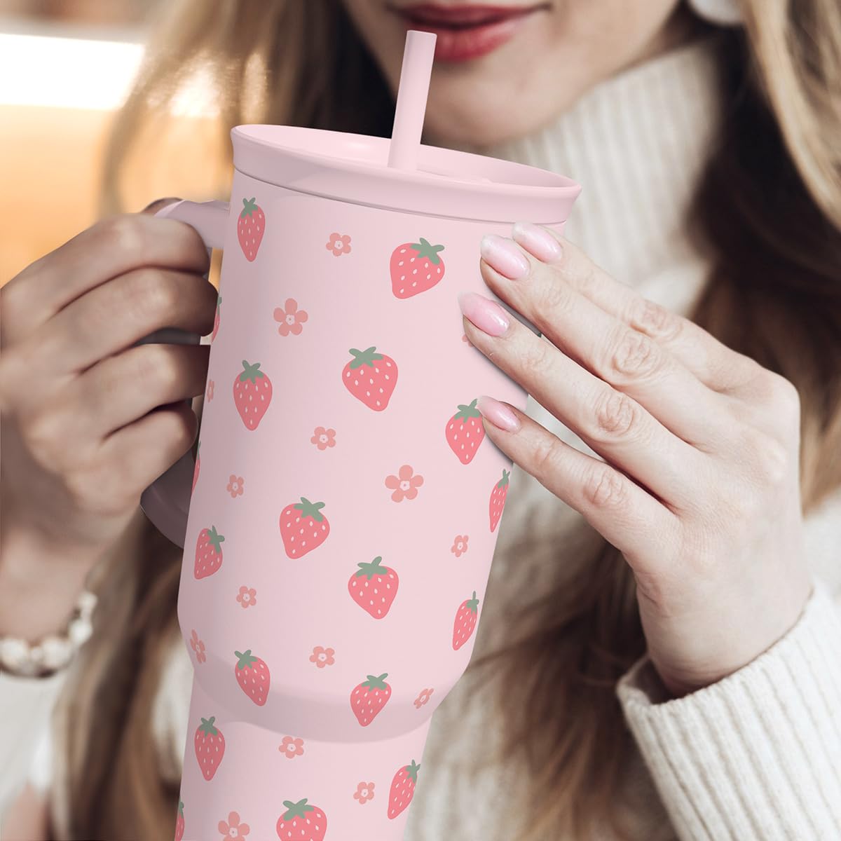 SANDJEST strawberry tumbler inside backpack shows travel-ready convenience