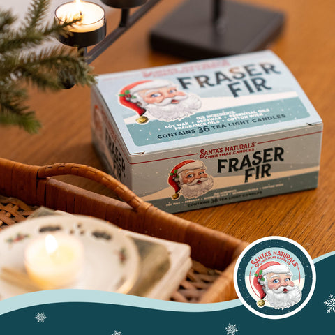 Santa's Naturals tea lights arranged on a holiday table creating seasonal scent benefit: festive atmosphere