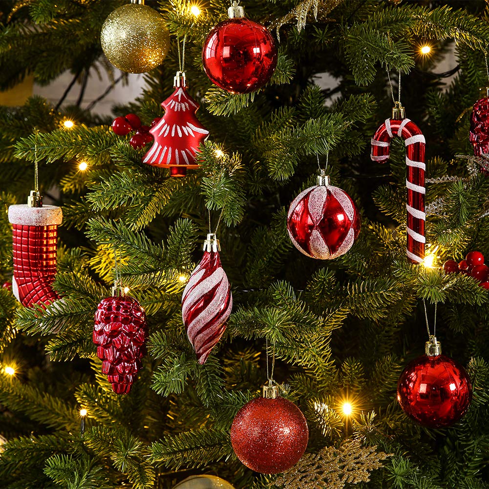 Sattiyrch lifestyle tree display with red ornaments creating classic festive ambiance