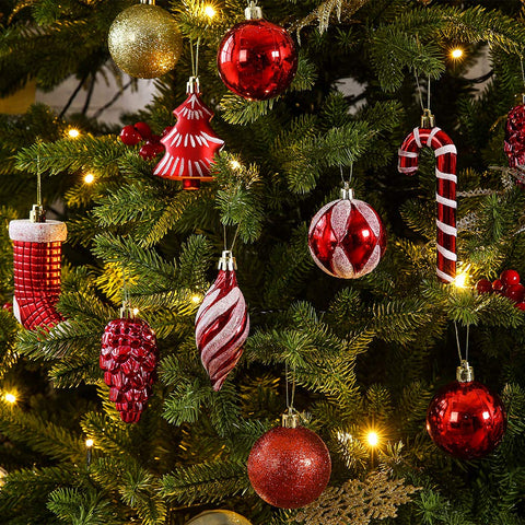 Sattiyrch lifestyle tree display with red ornaments creating classic festive ambiance