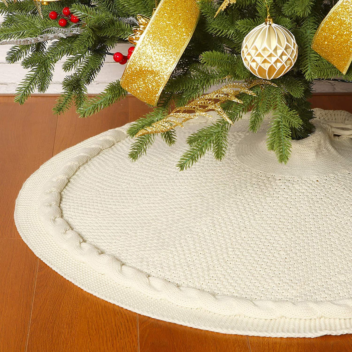 Sattiyrch cream tree skirt front view showing full cable knit and neat edge, adds cozy base
