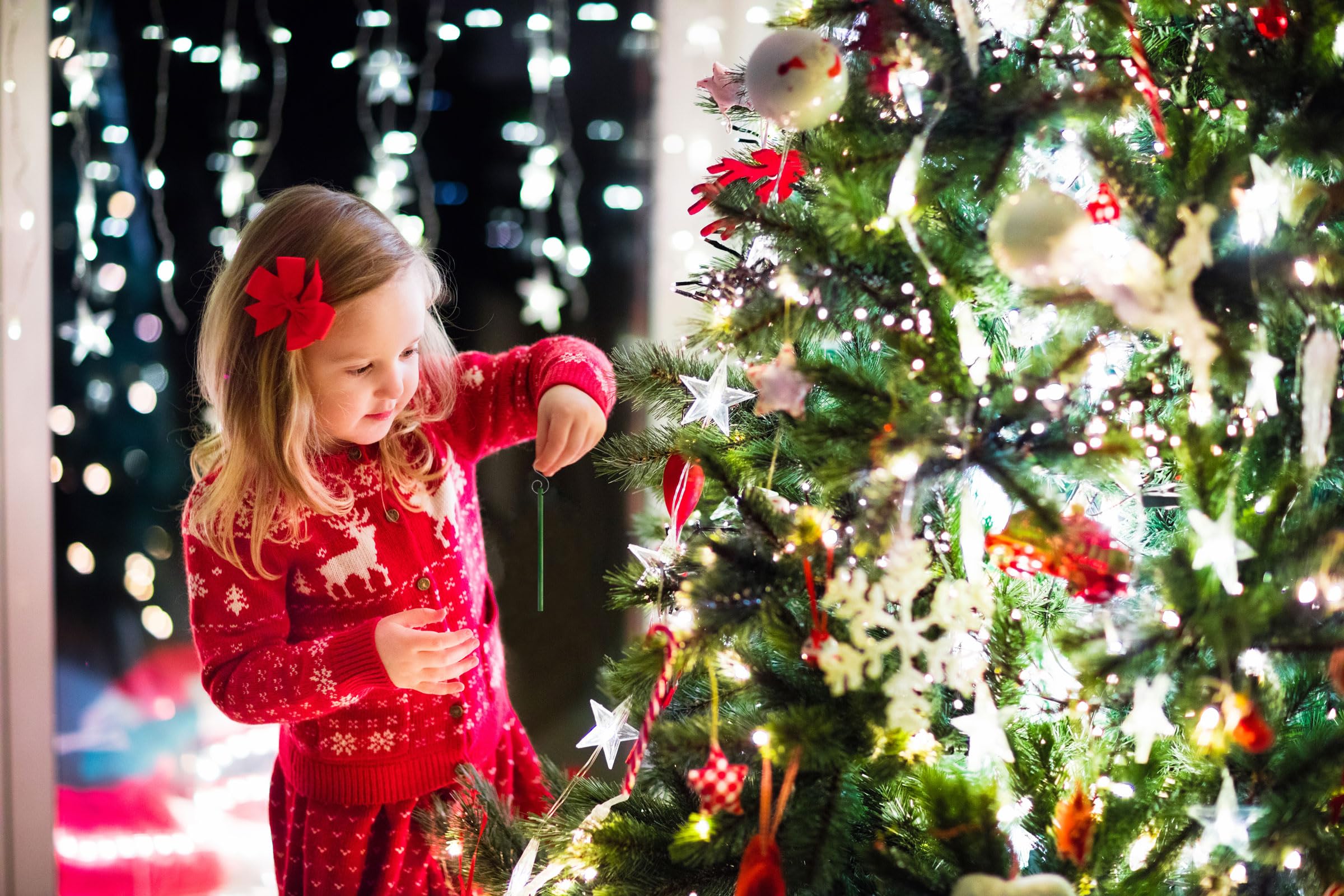 Scentsicles in a decorated tree scene creating cozy cinnamon ambiance for holiday rooms benefit