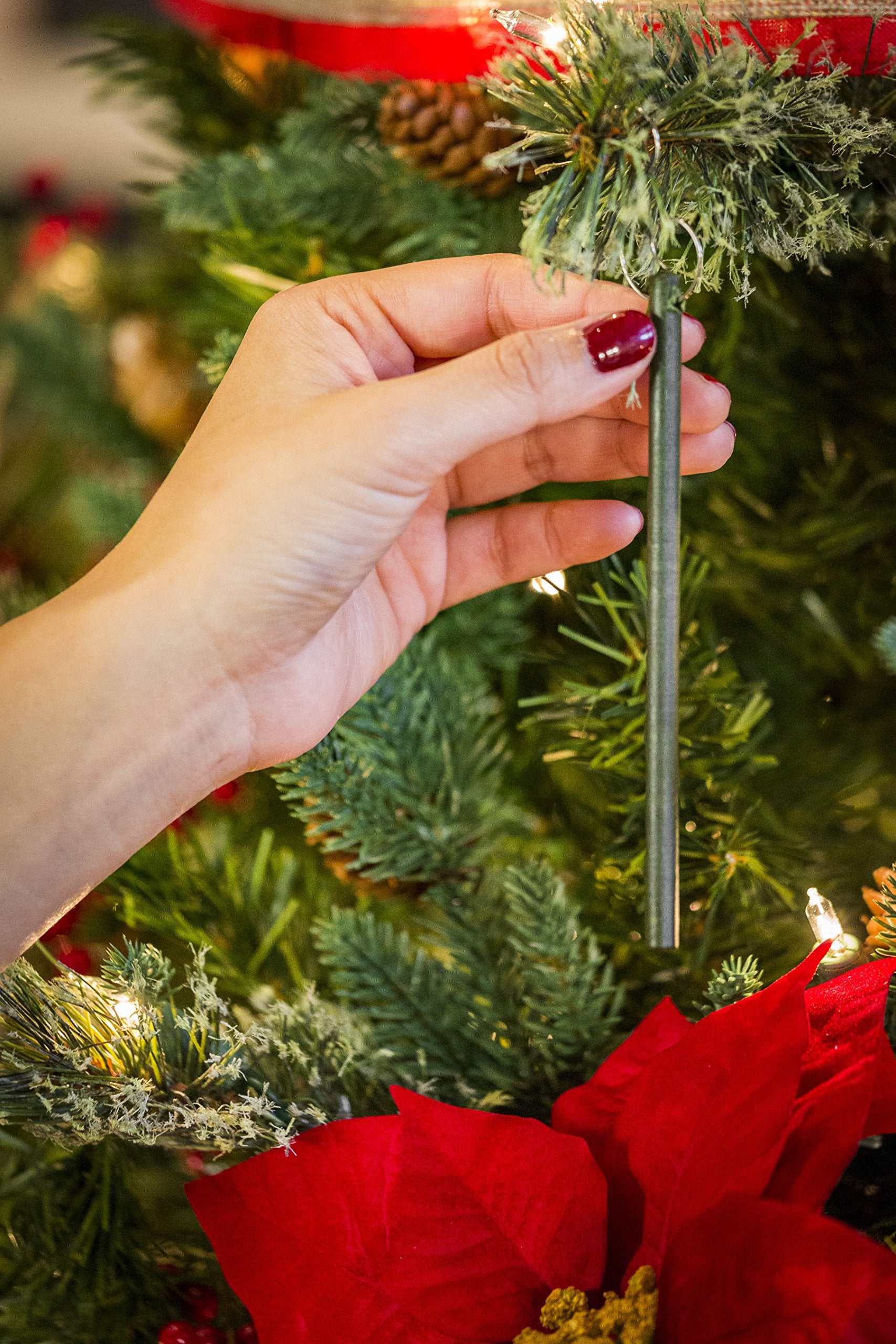 Scentsicles stick held in hand showing compact scale and simple placement benefit