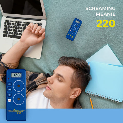 Screaming Meanie battery compartment open with 9V battery showing easy replacement