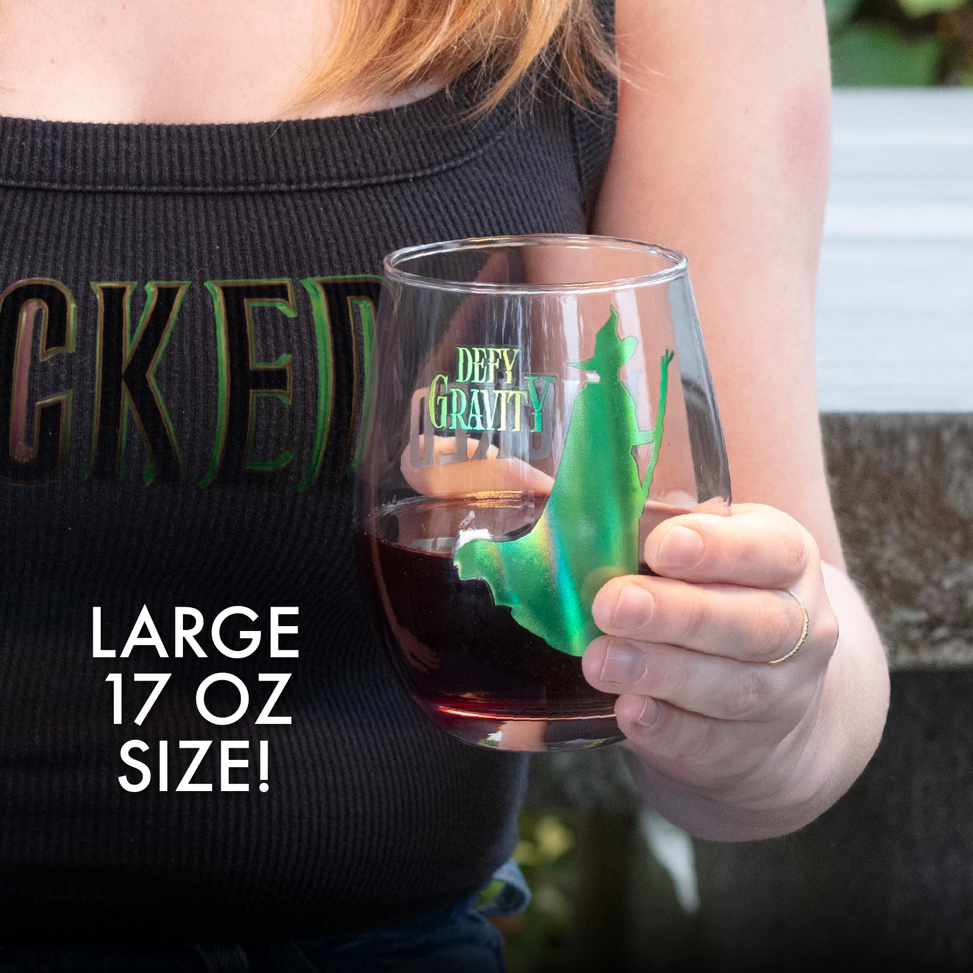 SCS Direct glass next to a smartphone for size comparison showing full 18oz capacity