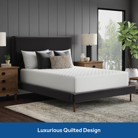 Sealy mattress pad styled on bed showing enhanced comfort and clean look