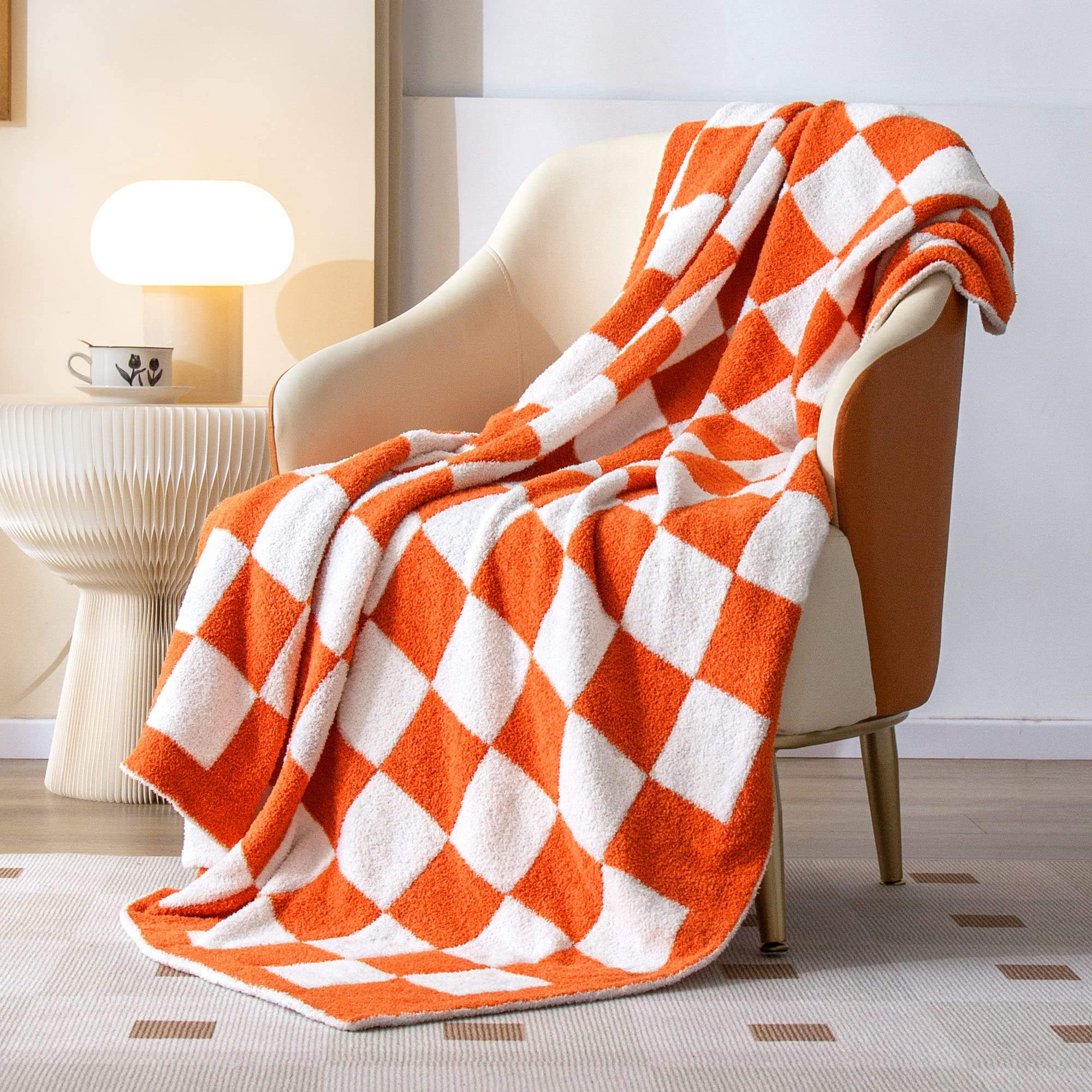SeaRoomy orange checkered front view showing vibrant couch accent