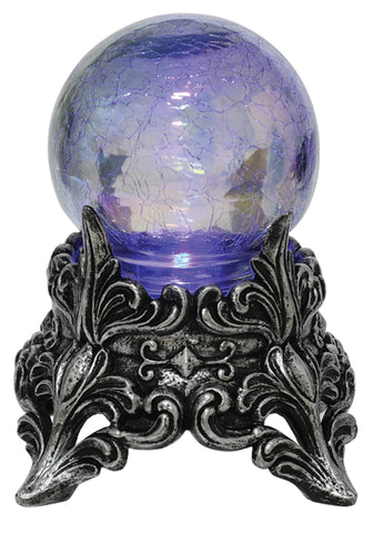 Seasons mystic crystal ball in Halloween vignette enhancing haunted decor mood