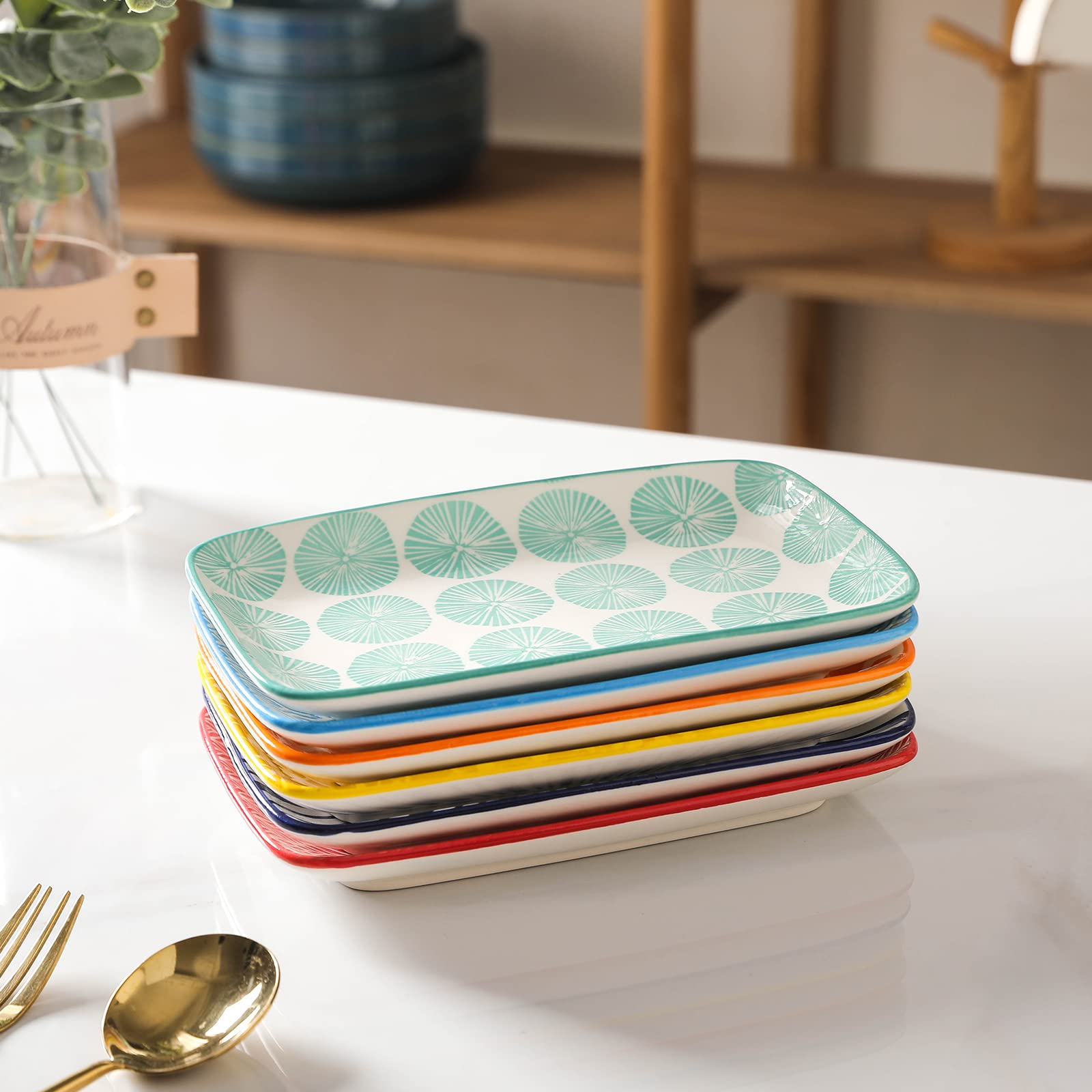 Selamica plates on a styled dining table highlighting colorful design for entertaining benefit