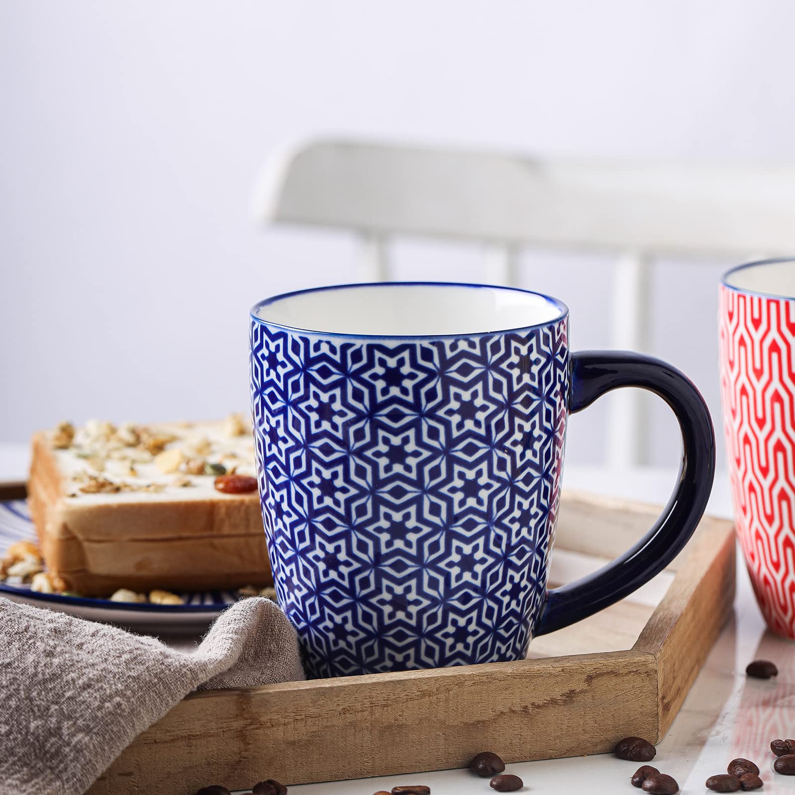 Selamica mug beside a phone for size comparison highlighting practical serving volume