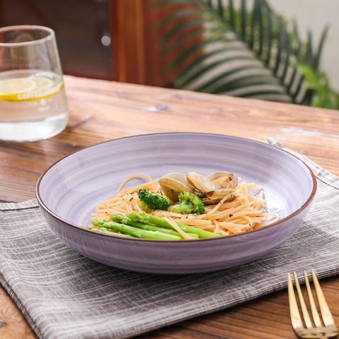 Selamica neatly stacked plates and bowls demonstrating space-saving storage