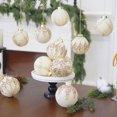 Senjie group of ornaments arranged on table showing cohesive color palette and elegant holiday styling benefit