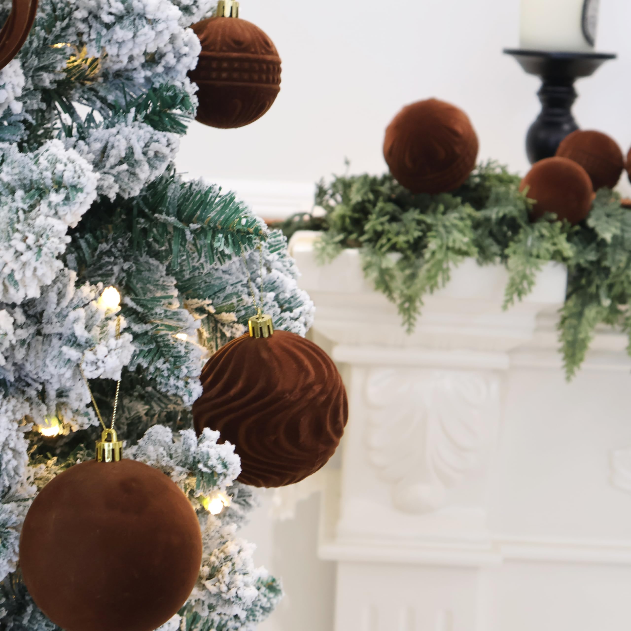 Senjie ornaments on a living room Christmas tree showing cozy, upscale holiday decor