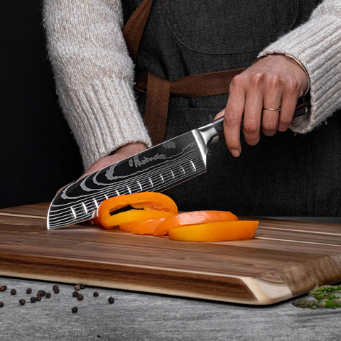 Senken Knives wooden handle detail demonstrating ergonomic grip and comfortable control