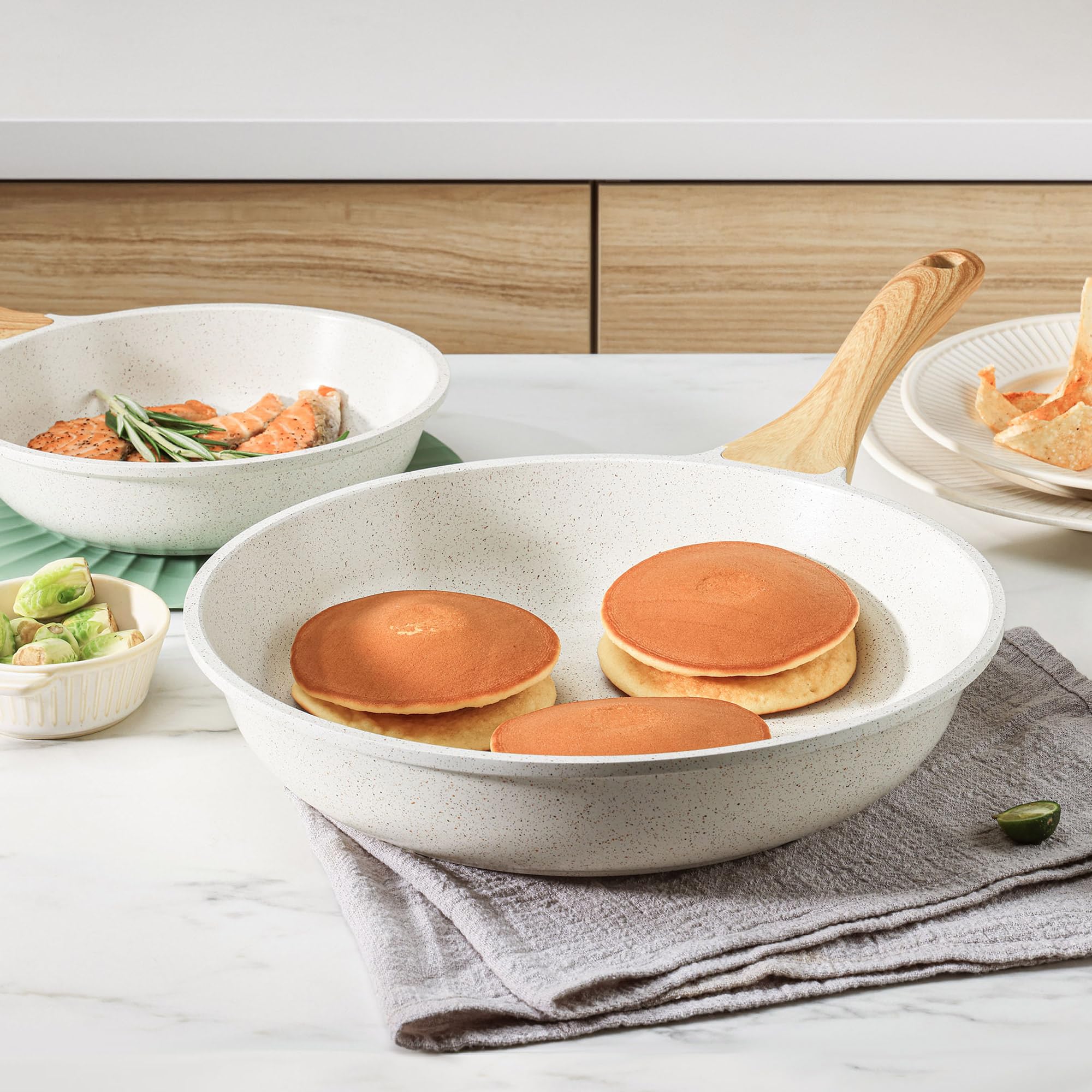SENSARTE pan beside spatula to show scale and practical kitchen fit