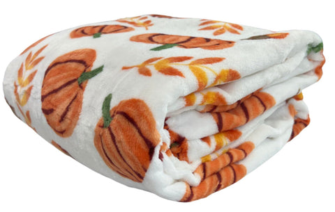 Serafina Home couple sharing throw on couch demonstrating comfortable sharing and warmth