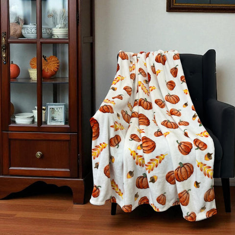 Serafina Home throw on chair for scale showing generous 50x70 size and full coverage