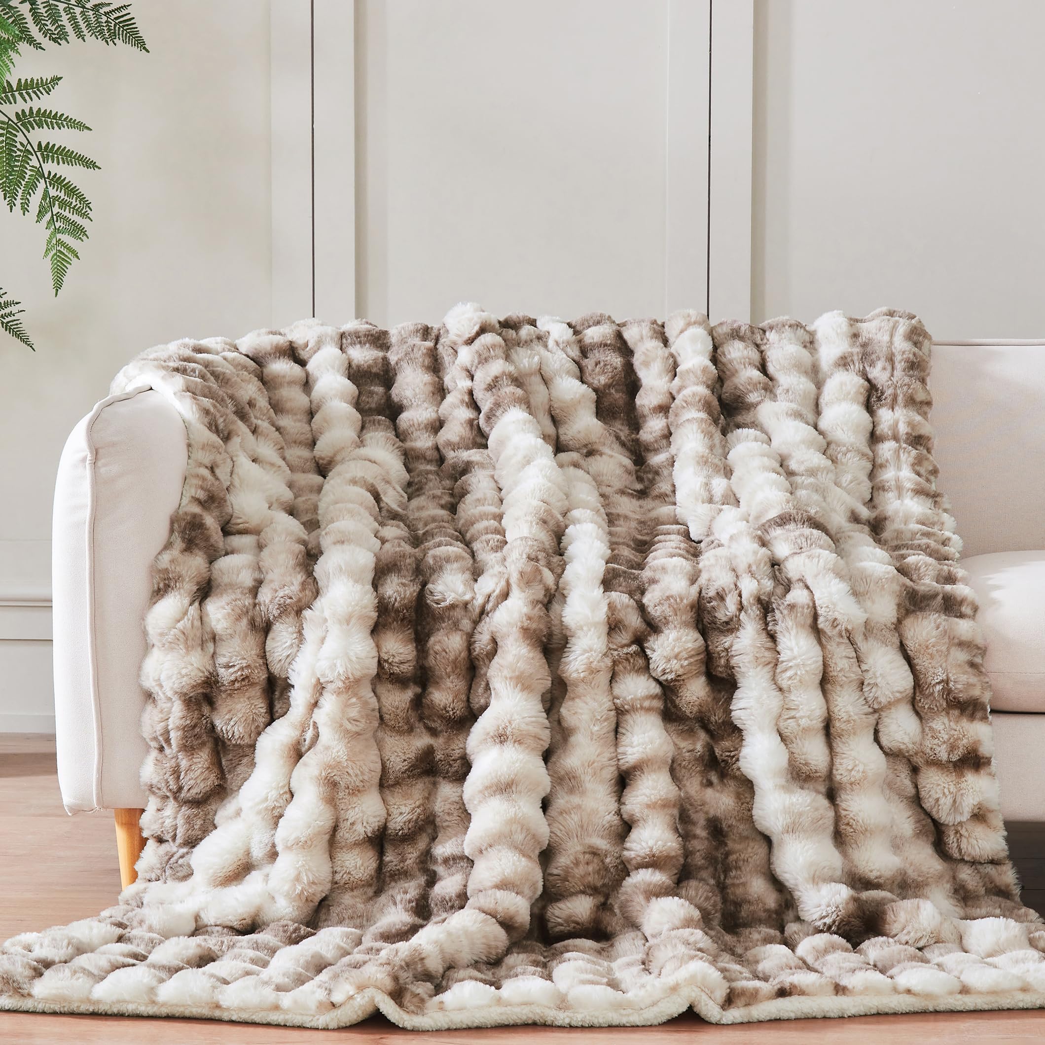 Serenhom blanket styled on sofa adding decor warmth and lounging comfort