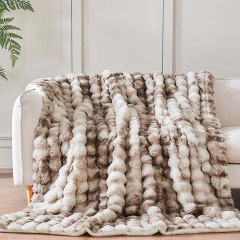 Serenhom blanket styled on sofa adding decor warmth and lounging comfort