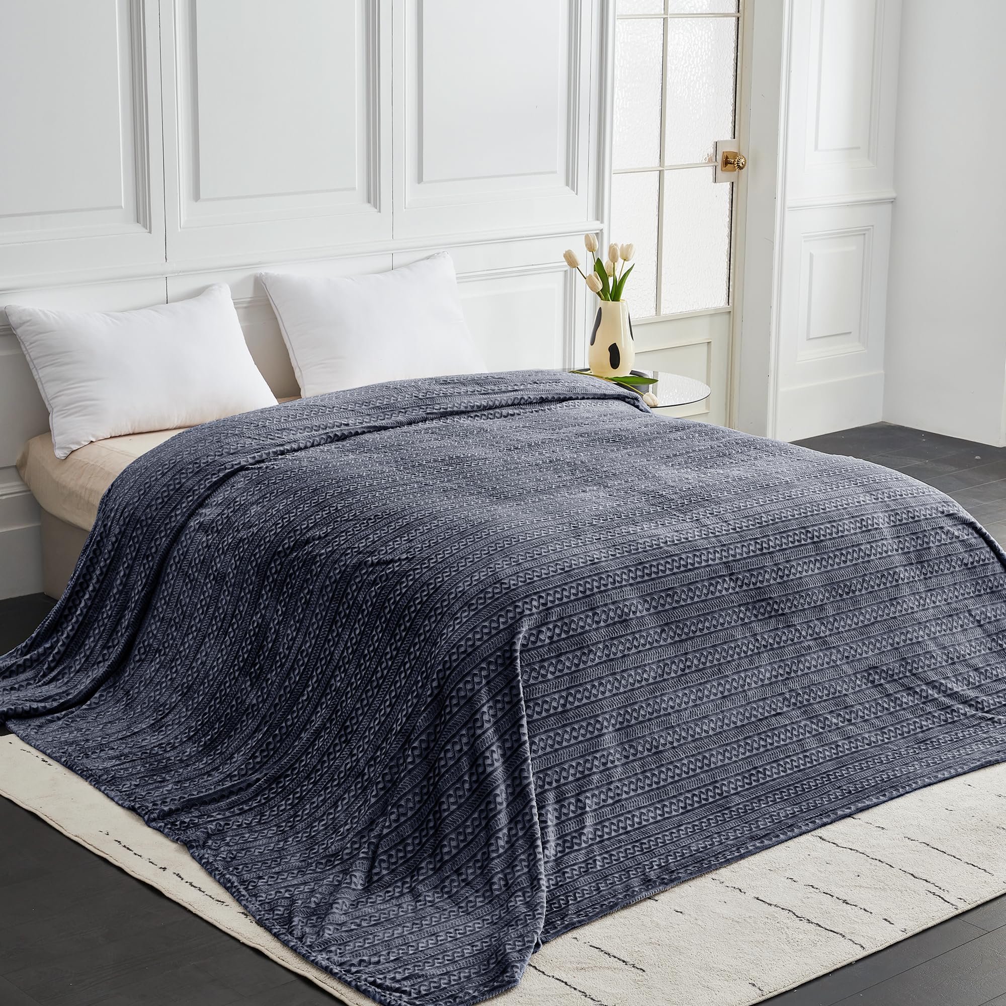 Serenhom oversized blanket draped on king bed showing generous scale