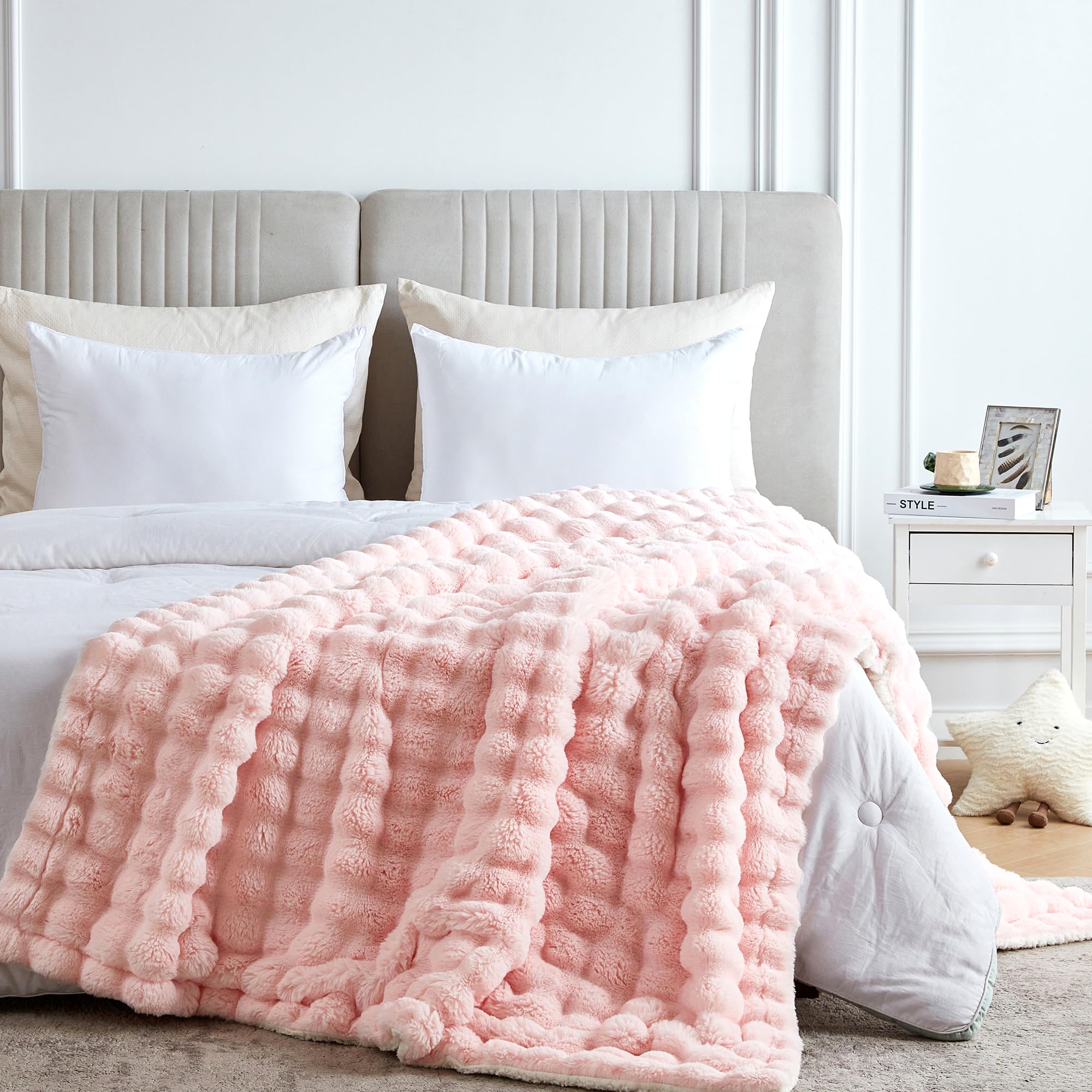 Serenhom throw beside standard pillow showing 50x60 inch scale for lap and couch use
