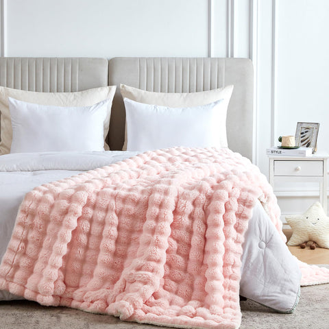 Serenhom throw beside standard pillow showing 50x60 inch scale for lap and couch use