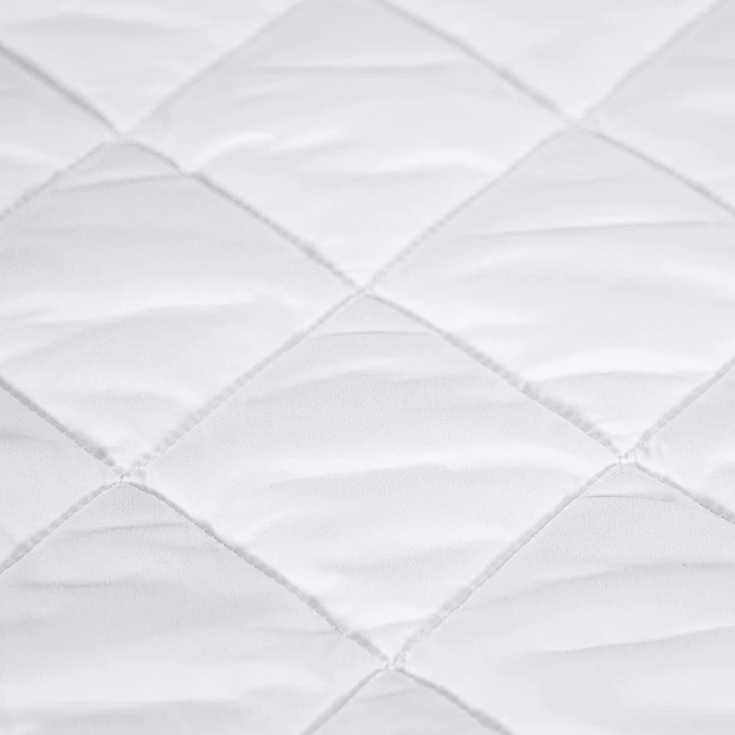 Serta skirt stretched to show 15" pocket and secure fit on thick mattress