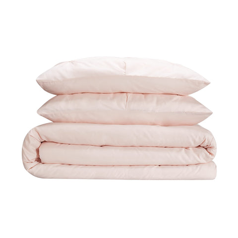 Serta duvet on bed with ruler showing Full/Queen scale and fit