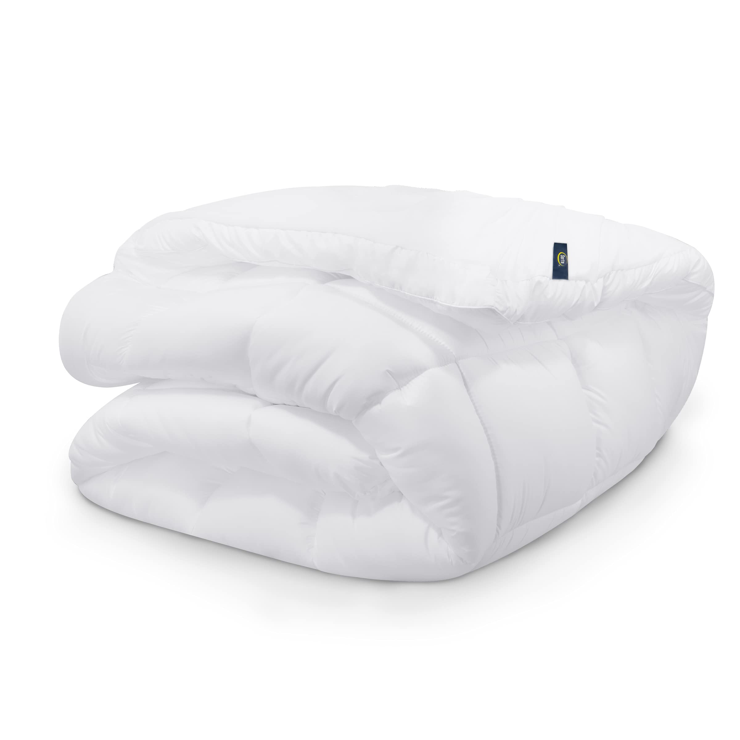 Serta topper on a made bed showing added cushioning for restful sleep