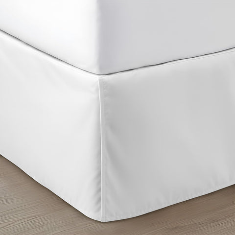 SGI Bedding front view showing pleated bed skirt for tidy bed finish