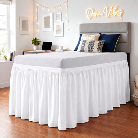 SGI bedding front view of white Twin XL bed skirt hiding frame and improving decor