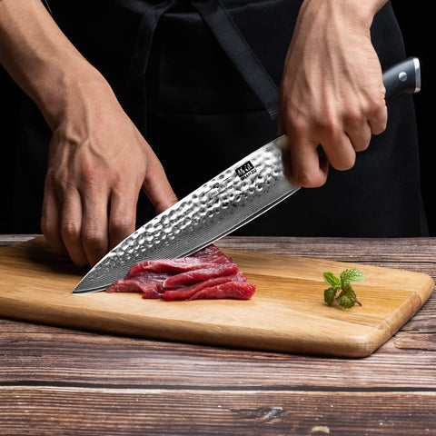 SHAN ZU blade edge close-up showing 15-degree angle and sharpness retention