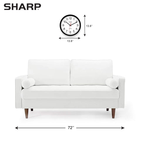 Sharp clock mounted in office setting providing quiet professional ambiance