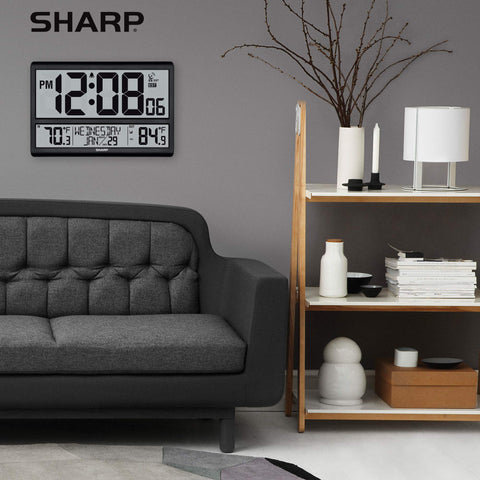 Sharp atomic clock mounted in kitchen showing effortless daily time reference