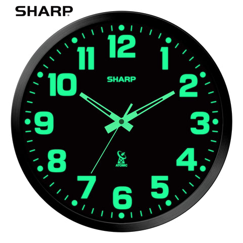 Sharp close-up of hands and numerals demonstrating glow-in-the-dark visibility at night