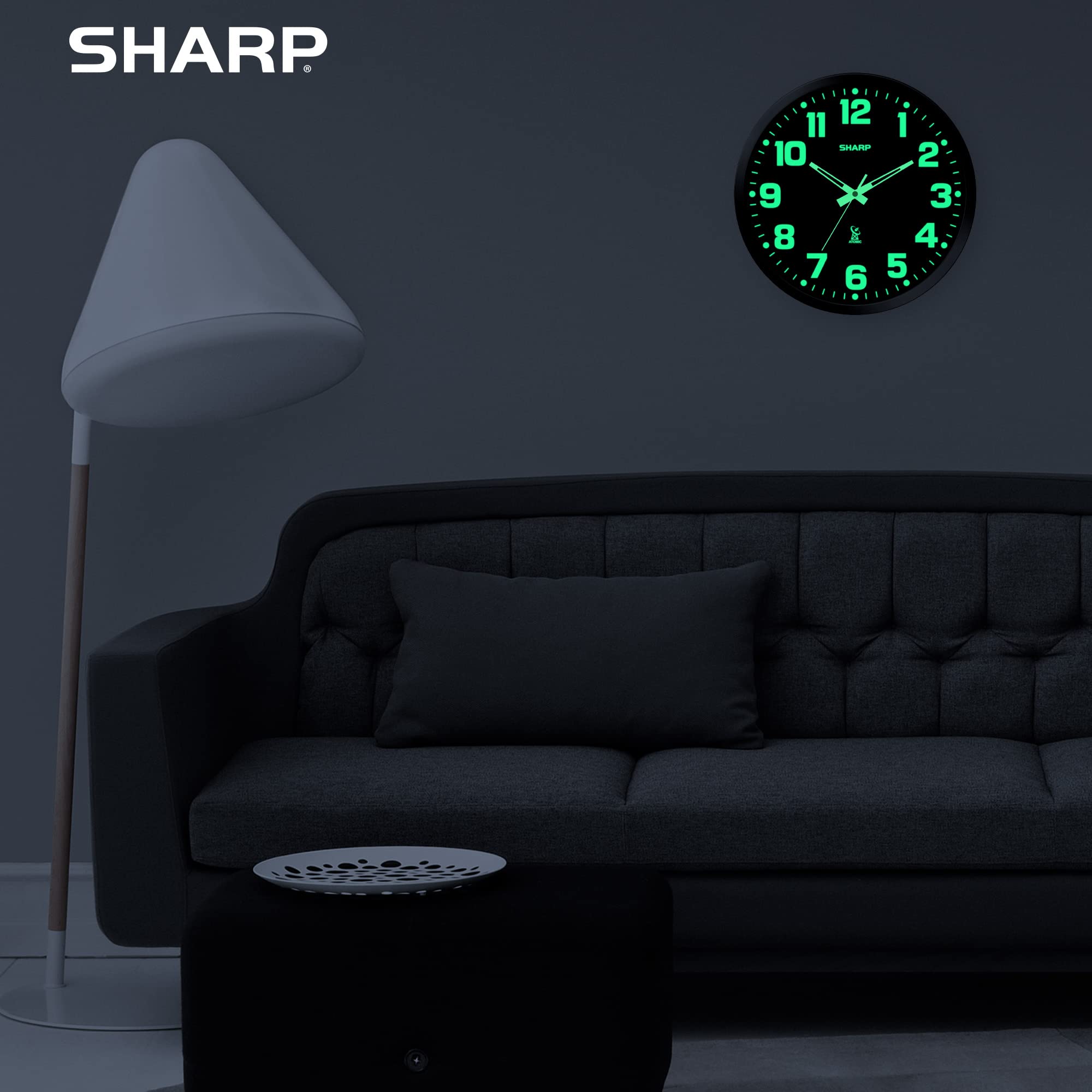 Sharp clock beside a ruler showing 12-inch size for correct scale and placement