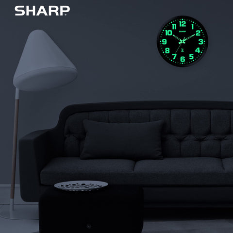 Sharp clock beside a ruler showing 12-inch size for correct scale and placement