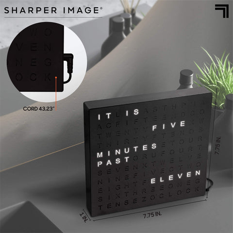 Sharper Image on nightstand in dim room offering soft, readable glow