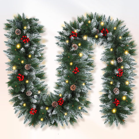 Shearly front view of 9ft garland showing full snow-frosted greenery and festive appeal