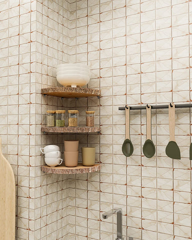 ShineZoom shelf with plant and candle in bathroom showing moisture-resistant finish benefit