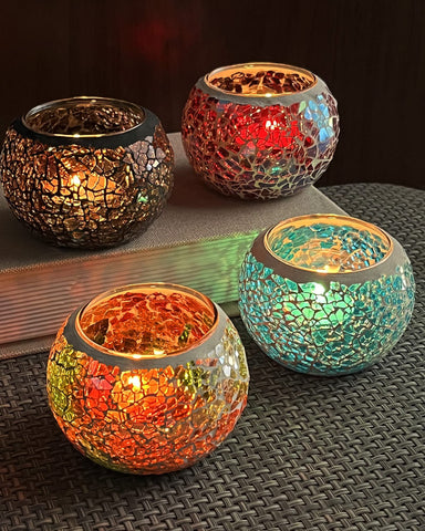 SHMILMH front view of four colorful mosaic votives showing all colors and packaging benefit