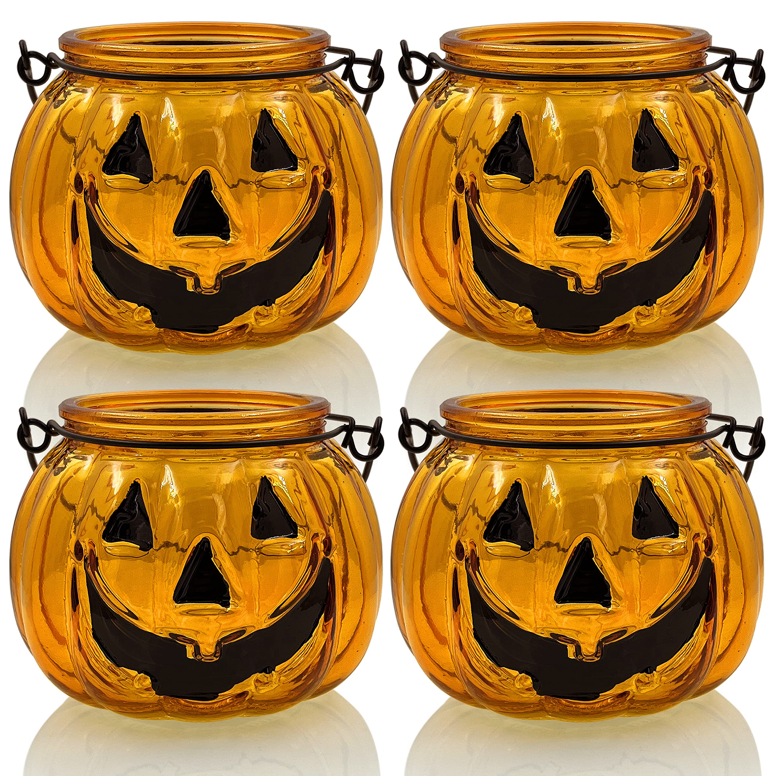 SHMILMH front view of four orange glass pumpkin holders adding festive glow