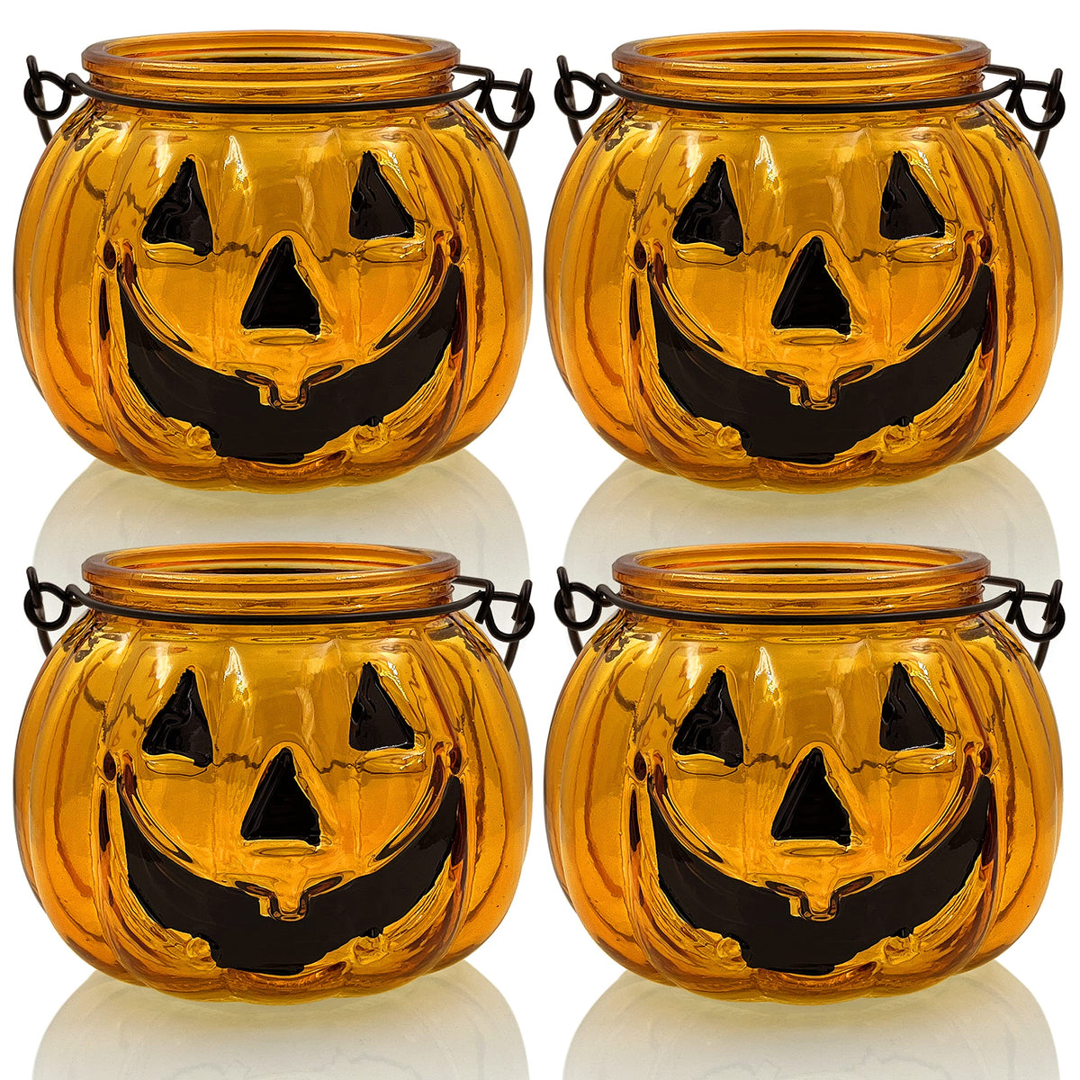 SHMILMH front view of four orange glass pumpkin holders adding festive glow