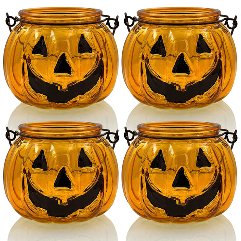 SHMILMH front view of four orange glass pumpkin holders adding festive glow