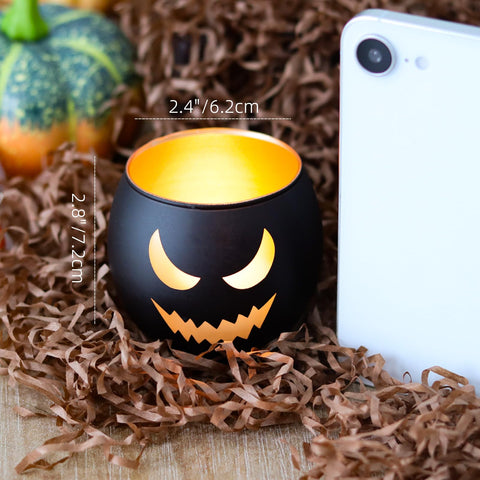 SHMILMH lit tealight inside holder creating warm glow and spooky ambiance
