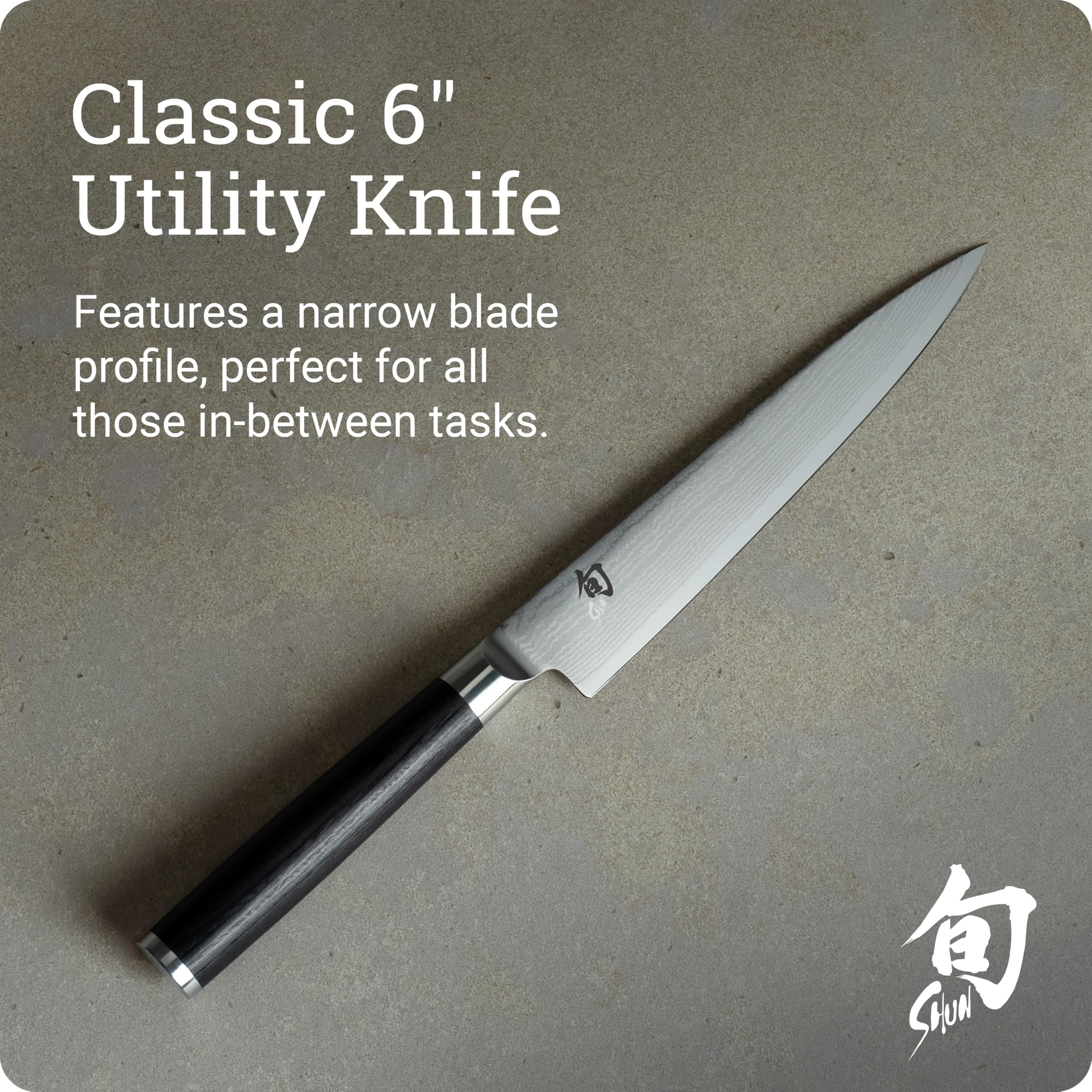 Shun Classic 6" handle close-up of D-shaped Pakkawood providing comfortable secure grip